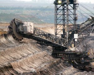 stock-photo-a-giant-bucket-wheel-excavator-in-a-brown-coal-mine-141266464